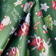 RUDI, karácsonyi mintás loneta lakástextil dekorvászon - zöld